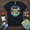 Kindergarten ABCD ROCKS t-shirt with yellow school bus, ABC letters, and lightning bolts