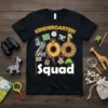 Black t-shirt with "Kindergarten Zoo Squad" text and cute zoo animal graphics, including a zebra, lion, monkey, and giraffe, designed