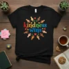 T-shirt with the text "kindness wins" in colorful rainbow letters, surrounded by diverse hands and hearts