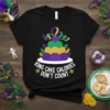 Black t-shirt with white text "King Cake Calories Don't Count" and a colorful tiered cake graphic
