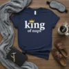 Navy t-shirt with white text "king of naps" and a gold crown graphic, featuring the primary keyword king of naps