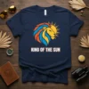 King Of The Sun t-shirt with a vibrant lion head graphic and a radiant sun behind it