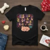 Kisses Hugs and Belly Rubs XOXO text with a cute sleeping puppy graphic on a black t-shirt