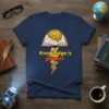 Knowledge is Power T-Shirt with brain, open book, and lightning bolt graphic. Features yellow and orange text