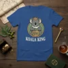 Koala King T-Shirt design featuring a crowned koala holding a shield with leafy branches