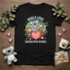 Koala Love Eucualtpus Kisses t-shirt design with a mama koala and baby koala sitting on a branch with a heart