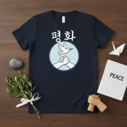 Korean text '평화' above a circle with clasped hands and a dove holding an olive branch, on a navy t-shirt