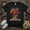 Krampus Skate Crew t-shirt featuring a red devil with horns and sunglasses riding a skateboard over a bonfire, wearing a
