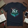 Krypton element design t-shirt featuring a futuristic city on a geometric base, with "Kr" and "Krypton" text