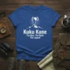 Kuku Kane The Man The Myth The Legend quote on a blue t-shirt with a mountain summit graphic
