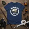 Kung Fu Papa t-shirt design with a white tiger, crossed nunchucks, and laurel wreath