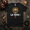 Black t-shirt with white "LA TUYA !" text, a roaring lion graphic above, and a red lightning bolt below