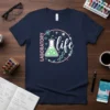 Laboratory life t-shirt design with a beaker, DNA helix, and atomic symbols in pink and green