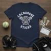 Navy blue t-shirt with white text "LACROSSE STICKS" and crossed lacrosse sticks graphic