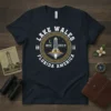 Navy t-shirt featuring a circular design with "LAKE WALES UNITED STATES OF FLORIDA AMERICA 19 11" text and a central