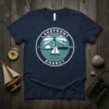 Lakefront Energy T-Shirt with lighthouse, sailboat, and wind turbines. Features the text "Lakefront Energy" and "Est. 2024"