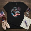 Land of the Free Home of the Brave design with eagle, flag, and fireworks on a black t-shirt, associated with