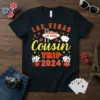 Las Vegas Cousin Trip 2024 text with casino graphics on a black t-shirt, featuring dice, playing cards, and the Welcome