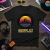 LASERBEAT CITY SOUNDWAVES OF TOMORROW text on black t-shirt with retro sunset cityscape graphic
