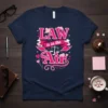 Navy t-shirt with pink "LAW is in the Air" text and scales of justice graphic, suitable for lawyers and legal