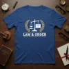 Law & Order t-shirt design with scales of justice, open book, and laurel wreath