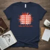 Navy t-shirt with "Lawdy Mercy Father God Jesus Lord" text in red and white, featuring a sunburst graphic