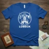 Blue t-shirt with white Lübeck city skyline graphic and text, featuring historic buildings and churches within a circle
