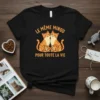 Le Même Minou Pour Toute La Vie French text and illustration of two orange tabby cats hugging on a black