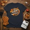 Leaf Blower t-shirt design with autumn leaves and a graphic of a leaf blower