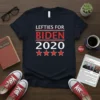 Lefties For Biden 2020 text design with four red stars on a navy t-shirt