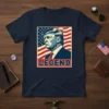Navy t-shirt with a portrait of Donald Trump against an American flag background and the word LEGEND below