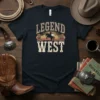 Legend of the West graphic t-shirt with a silhouette of a cowboy on a horse against a sunset background
