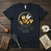 Let It Be Honey t-shirt with a cute cartoon bee wearing goggles and surrounded by honeycomb