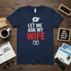 Navy t-shirt with white and red text "LET ME ASK MY WIFE" and two interlocking rings graphic