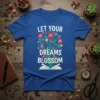 Let Your Dreams Blossom quote t-shirt with a colorful floral tree growing from an open book