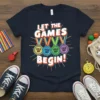 Let the Games Begin Field Day t-shirt design with colorful medals and bold text, perfect for school sports events