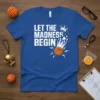 White text "Let The Madness Begin" with a graphic of a basketball exploding, on a royal blue t-shirt