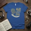 Let The Music Speak quote t-shirt with a profile of a head made of musical notes and a piano keyboard