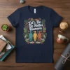 Let's Be Better Humans quote t-shirt design with colorful floral border and three diverse figures holding hands