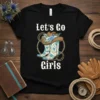 Let's Go Girls t-shirt with cowboy boots, hat, and floral accents in a western graphic style