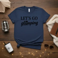LET'S GO glamping text on a navy blue t-shirt, with a crown graphic above the word glamping