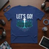 Let's Go! quote with split computer keyboards and digital circuit design on a blue t-shirt