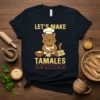 Let's Make Tamales text with a cute cat chef illustration preparing tamales, on a black t-shirt