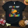 Let's Taco Bout My Birthday t-shirt design featuring colorful text, a festive taco graphic, and confetti
