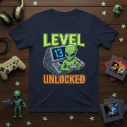 Level 13 Unlocked t-shirt design with an alien playing video games and glowing text