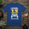 Blue t-shirt with "Level 13 Unlocked" text and a video game controller graphic, perfect for a 13th birthday gamer