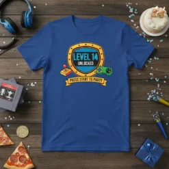 Level 14 Unlocked Press Start To Party T-Shirt with video game controllers and shield graphic, celebrating a 14th birthday