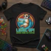 Meerkat wearing headphones playing a video game, text "Level Up! Gamer Mode Activated" on a black t-shirt