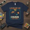 Leveled Up To Cousin Est. 2026 T-Shirt featuring pixelated video game graphics and text