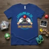Leveling Up To Big Brother t-shirt with pixelated joystick and text in blue and orange